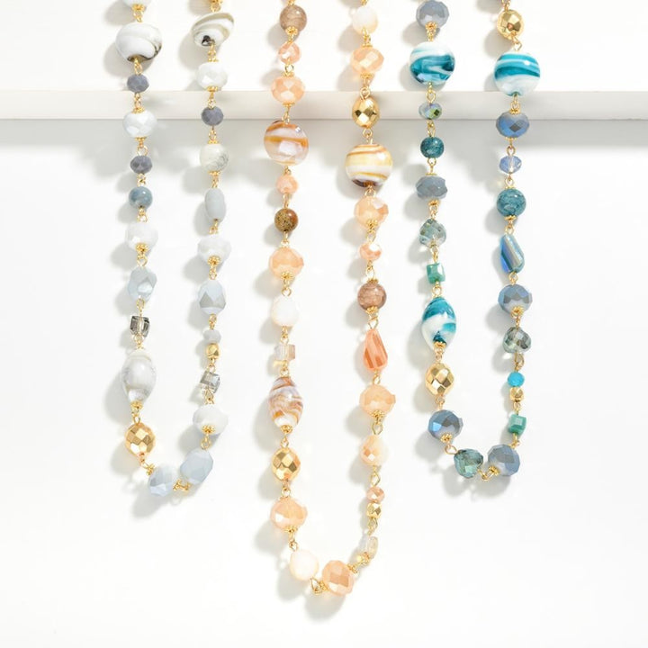 Long Gold Chain Link Necklace Featuring Glass & Faceted Beads